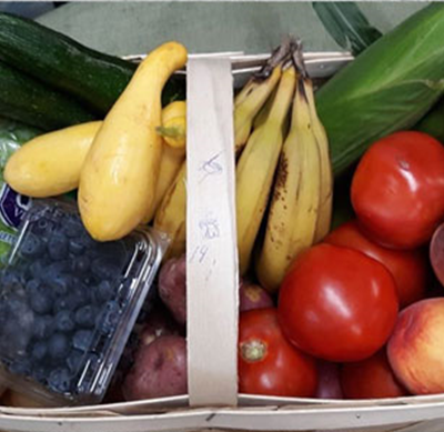 A basket of seasonal fruits and vegetables